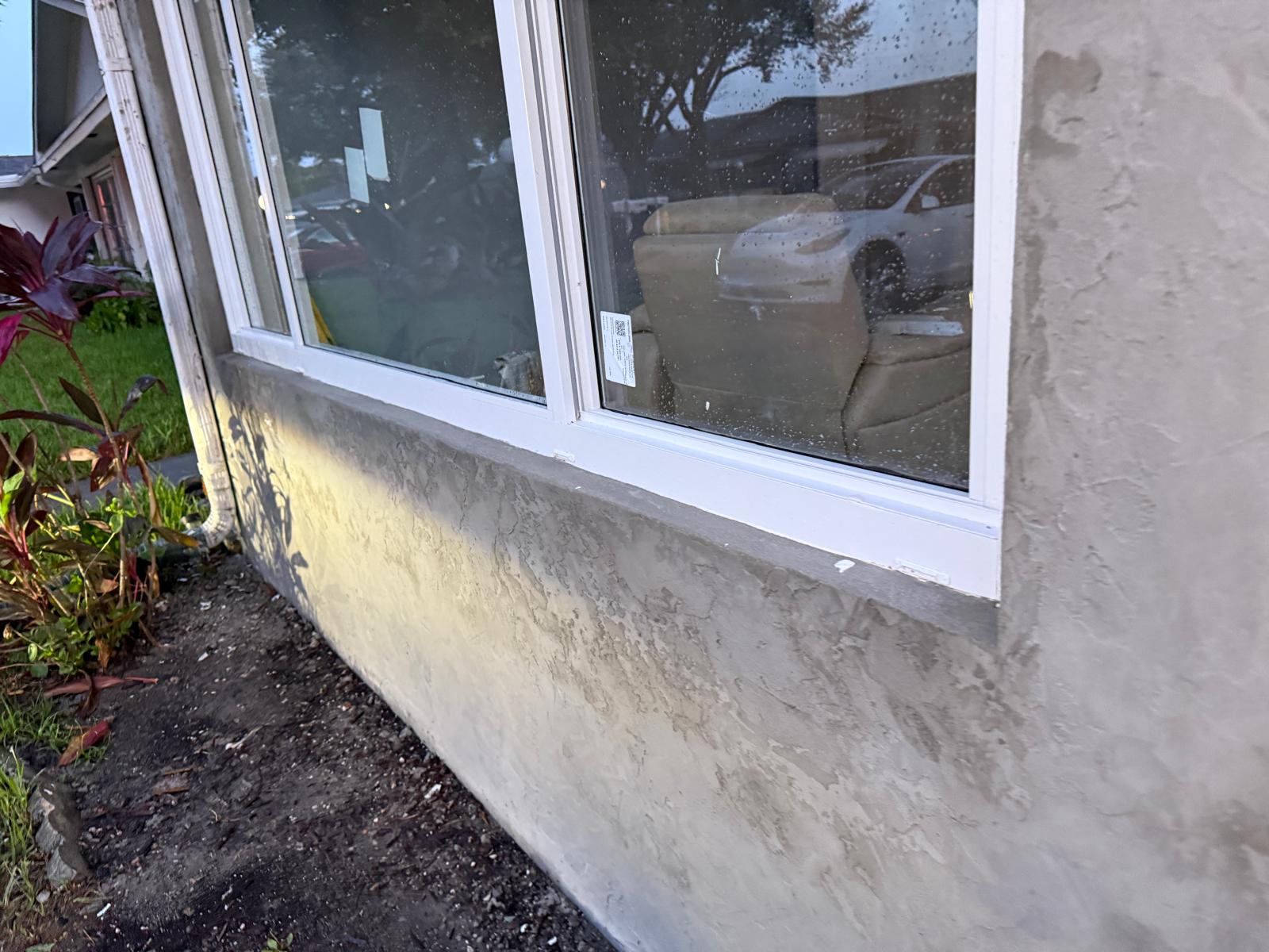 Impact window installation by Qrown Design Build